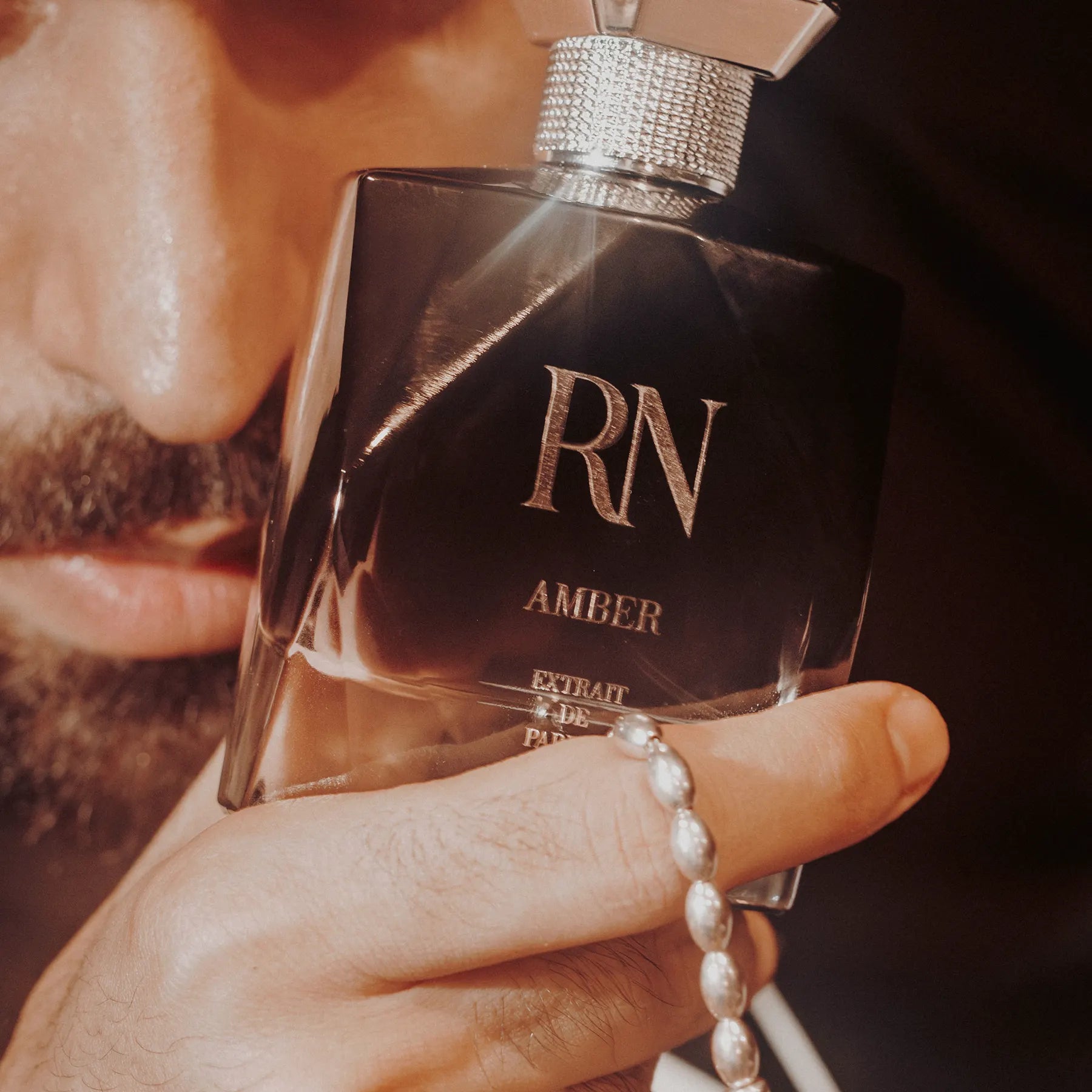 The sculptural details of an RN fragrance bottle